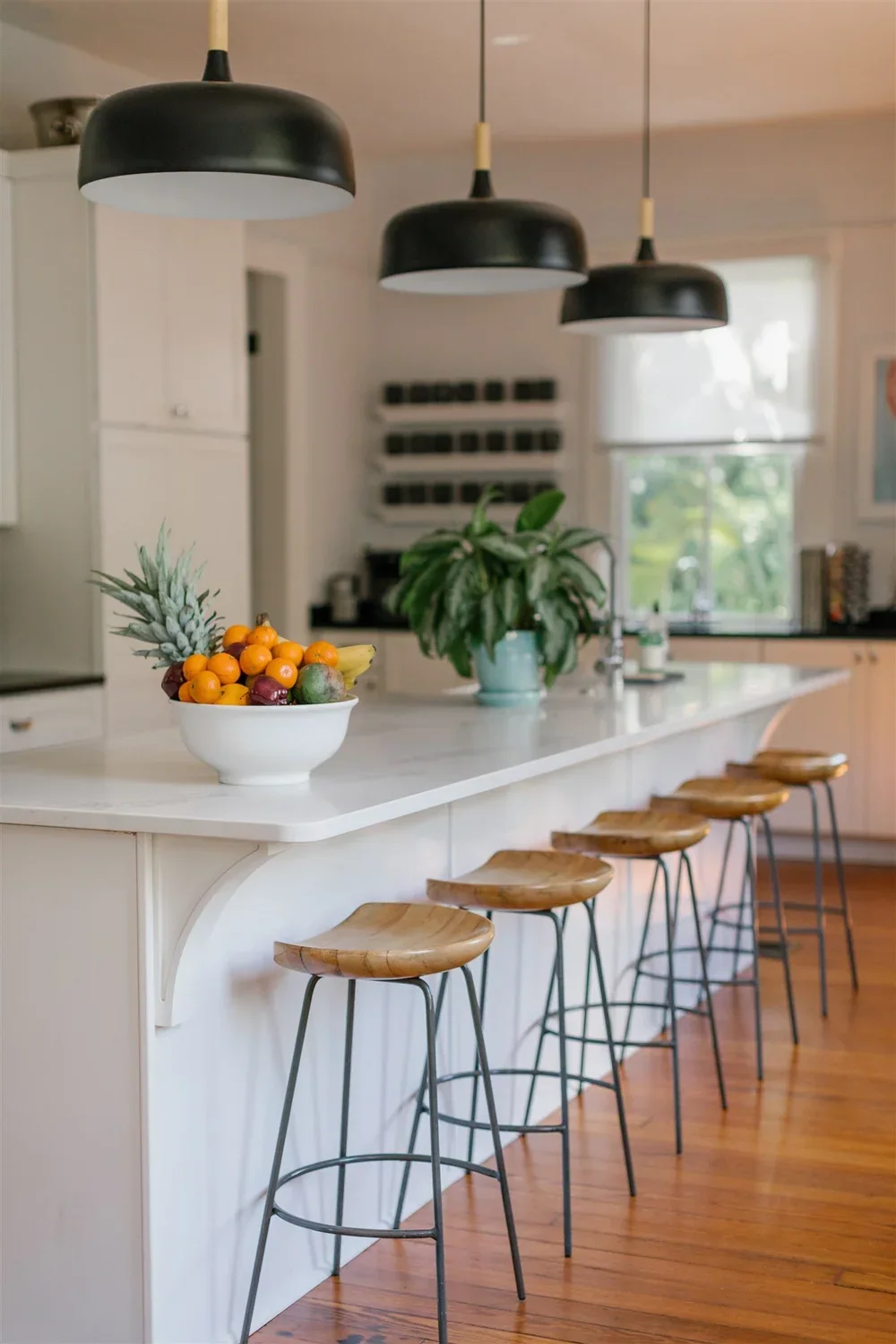 Kitchen bar seating and open shelving