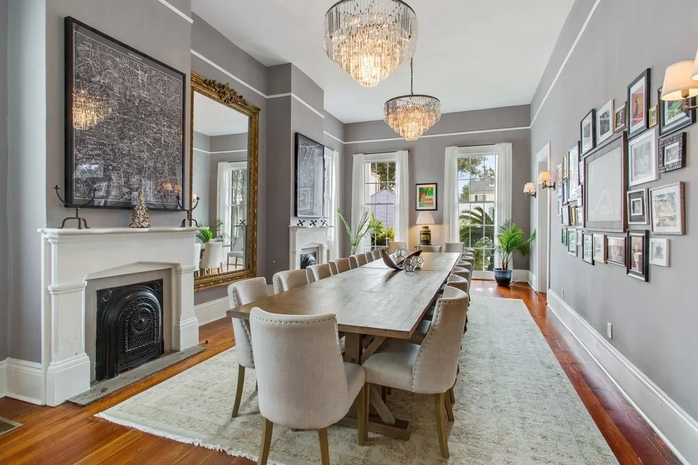 Dining room with chandelier and long table at The Mazant